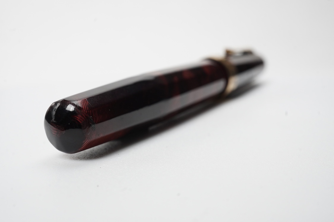 A Wahl Eversharp lever fill 'Doric' fountain pen in garnet colour with gold filled trim